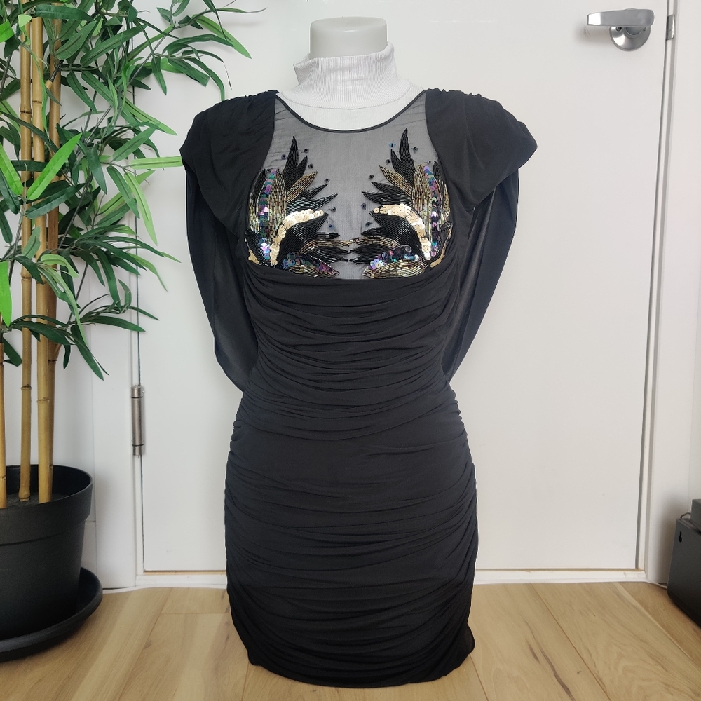 Vintage bodycon ruched dress with sequin cleavage details
